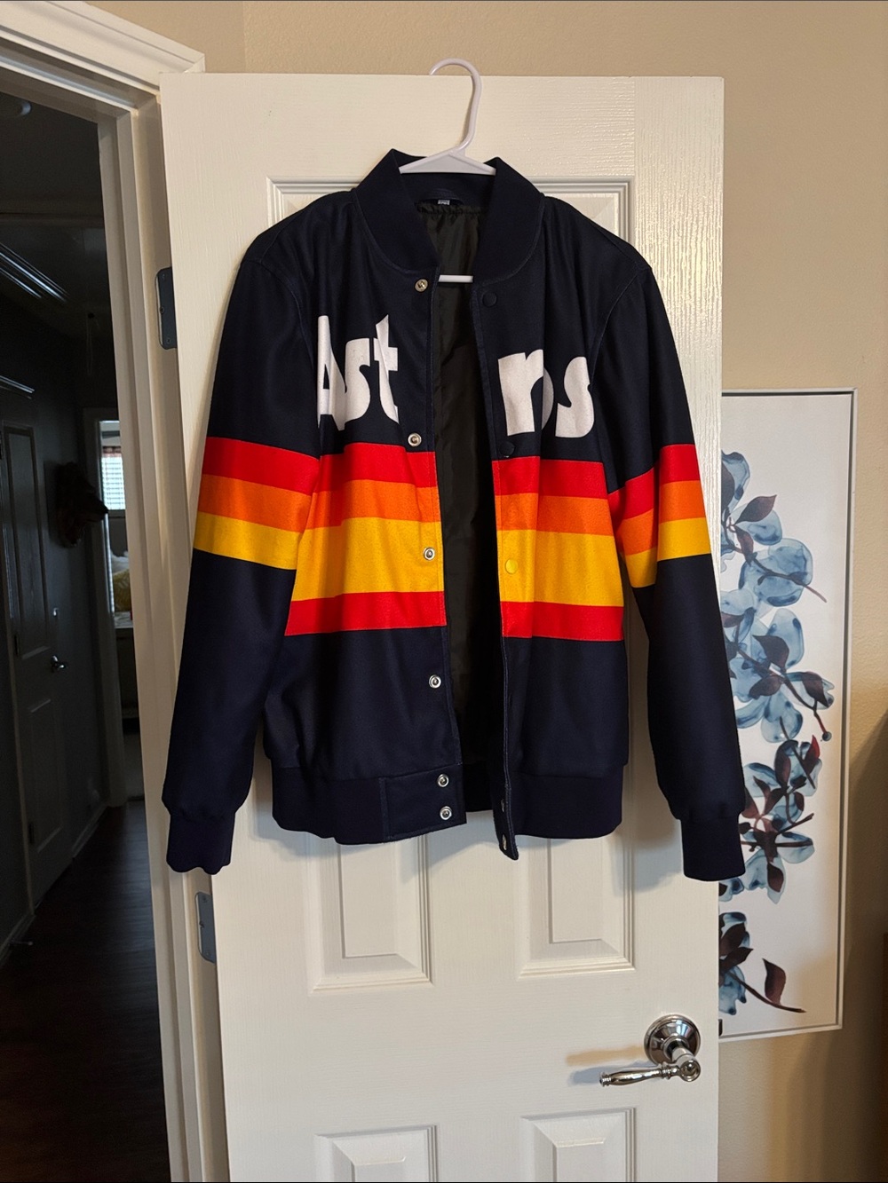 (Source Unknown )Navy Bomber Jacket with Red & Yellow Stripes. Astros